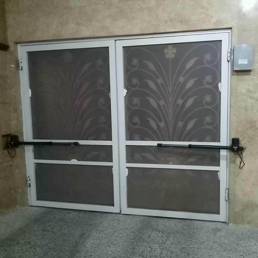 قیمت جک برقی درب پارکینگ پارکینگ تجاری در همدان