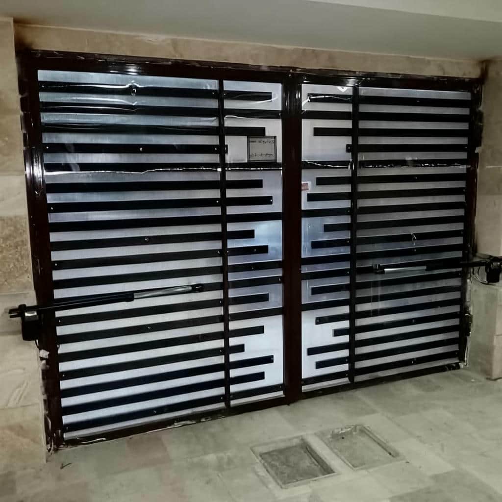 نصب جک برقی درب پارکینگ مدار فرمان در رفسنجان