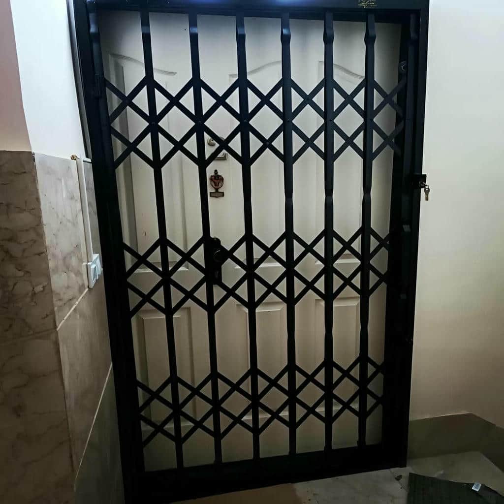 نصب درب آکاردئونی آهنی قفل ضدبرش در بابل
