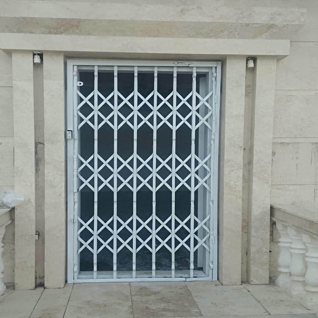 خرید درب آکاردئونی آهنی ساختار ریلی در بابل