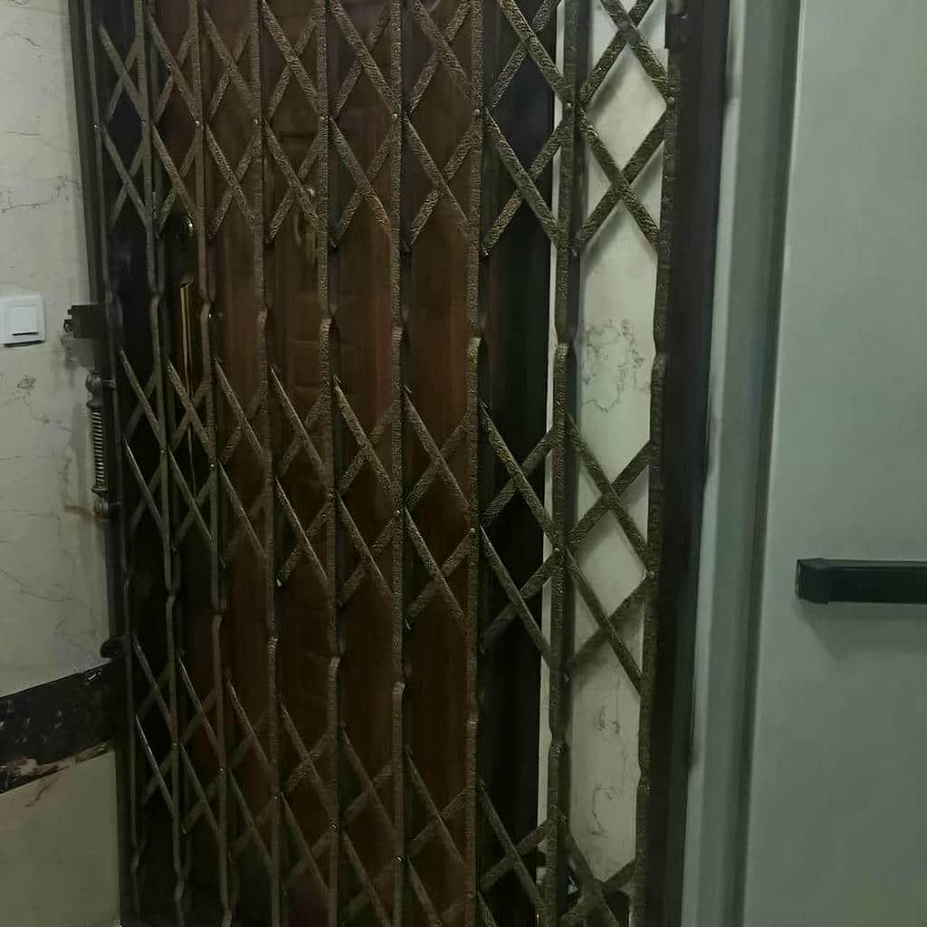 خرید درب آکاردئونی آهنی چندلوزی در بیرجند