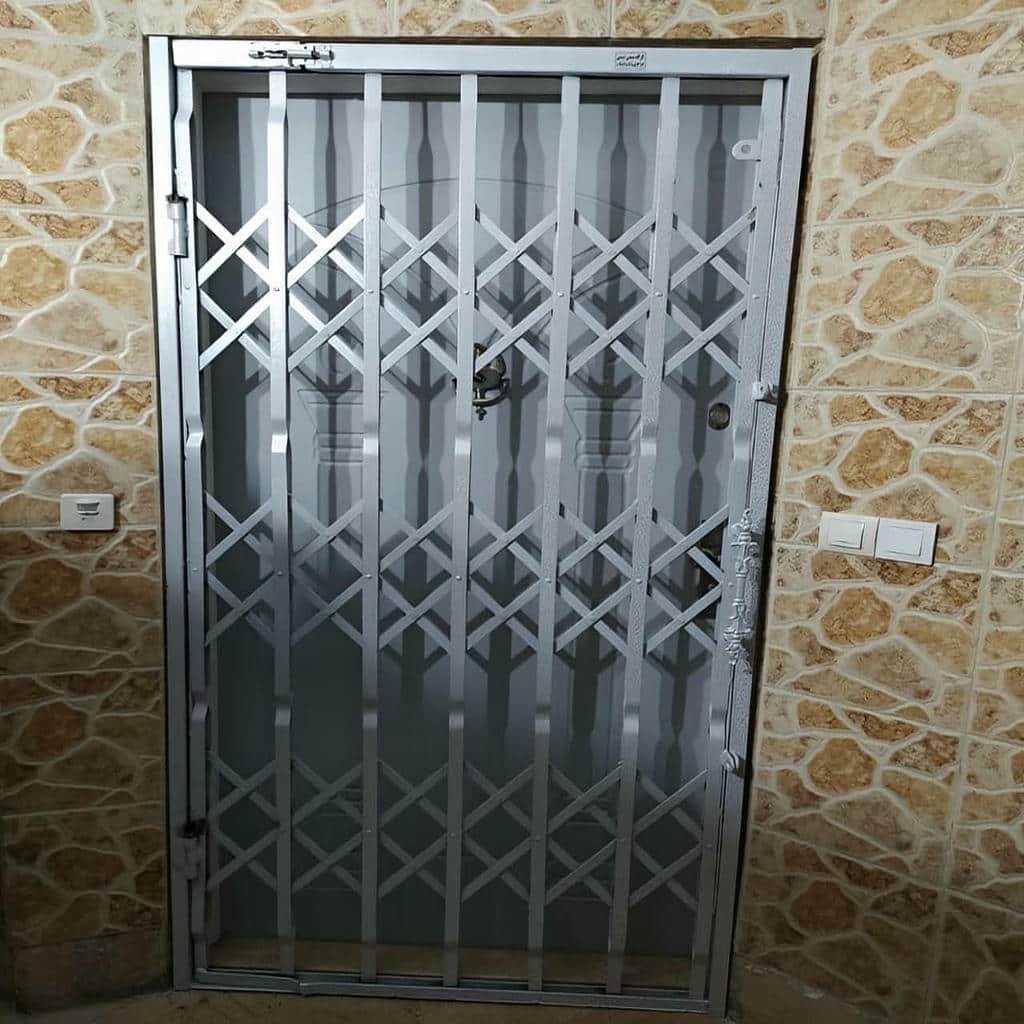 کارخانه درب آکاردئونی آهنی رنگ کوره ای در رفسنجان