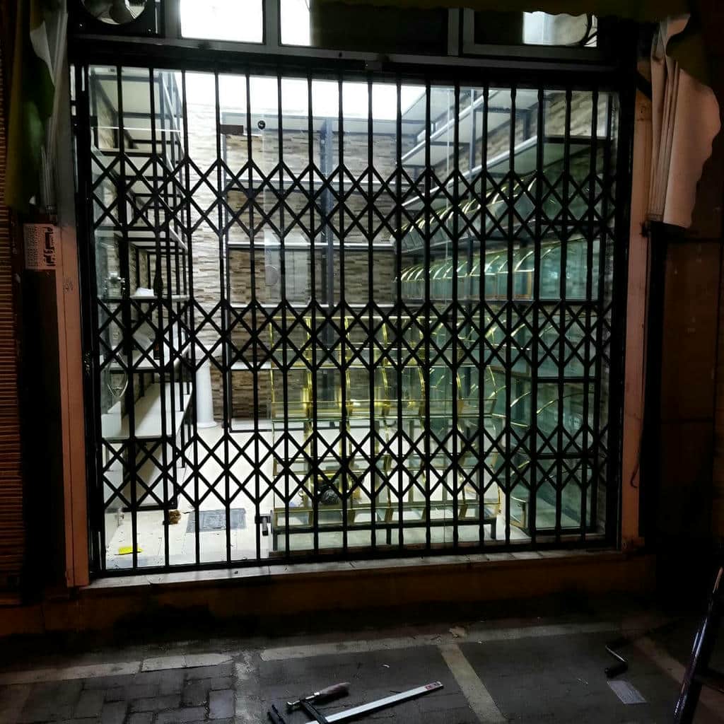 خرید درب آکاردئونی آهنی ساختار ریلی در فشم