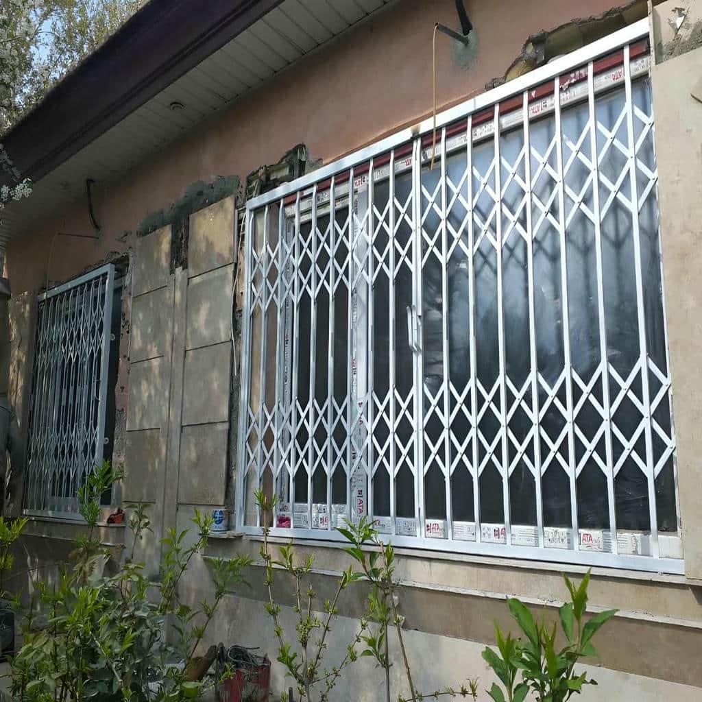 نصب درب آکاردئونی آهنی قفل ضدبرش در یزد