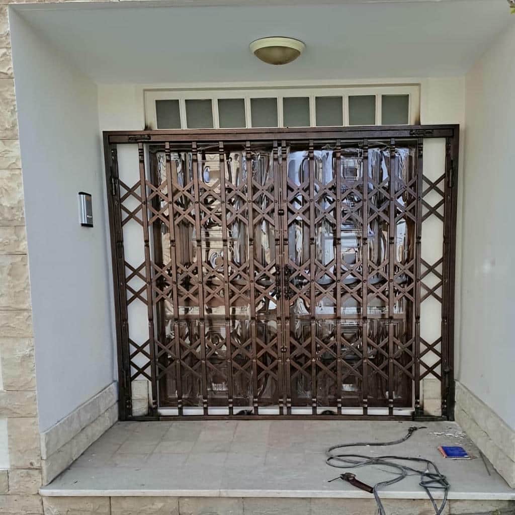 نصب درب آکاردئونی آهنی قفل ضدبرش در ایلام
