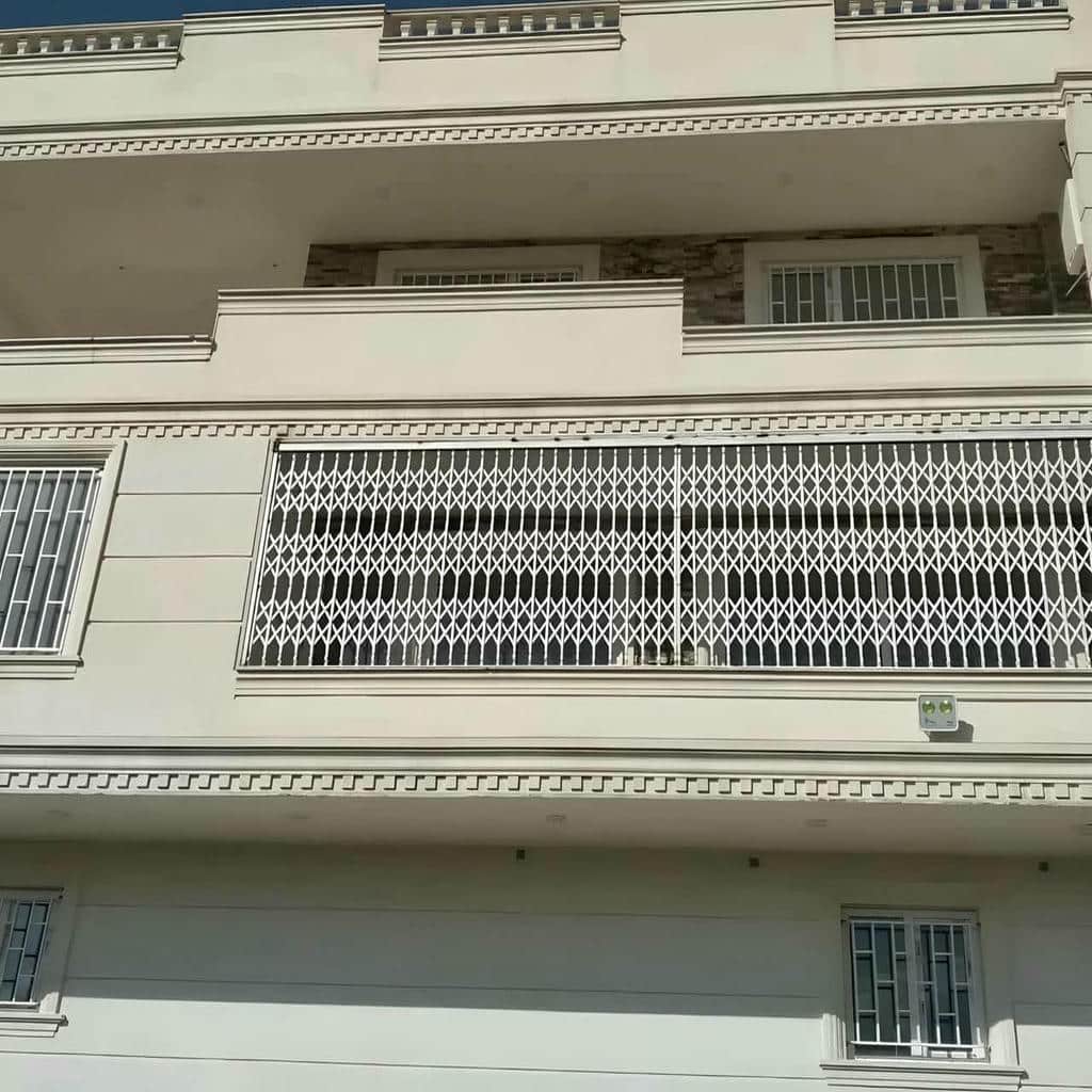 قیمت درب آکاردئونی آهنی تسمه دوبل در ساری