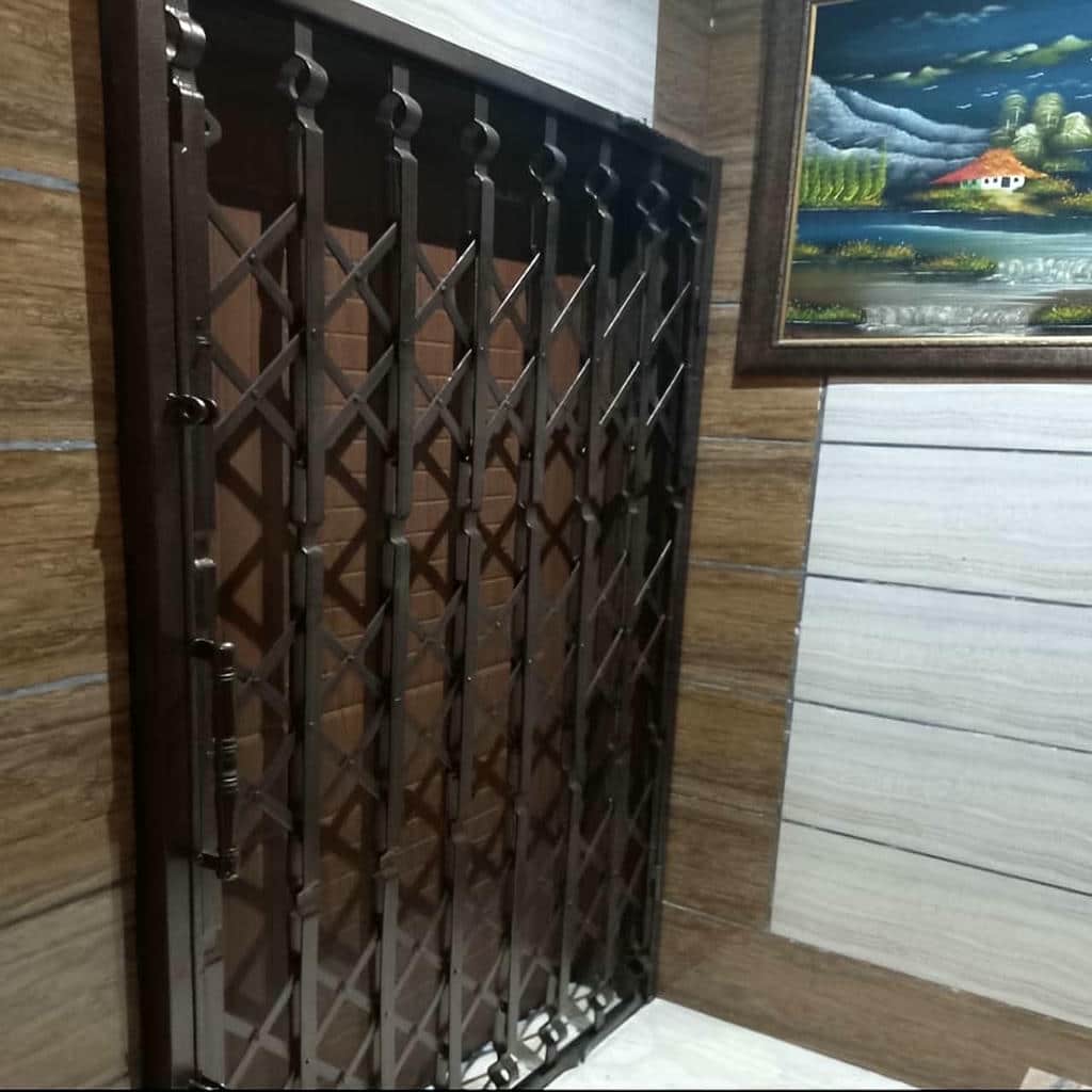 کارخانه درب آکاردئونی آهنی رنگ کوره ای در ساری