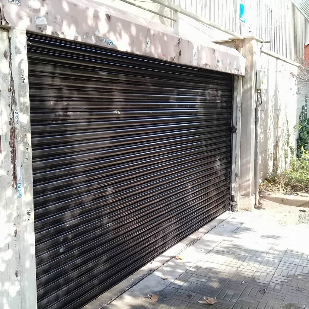 کرکره برقی صنعتی با شفت تقویت شده ورودی سوله کرکره برقی صنعتی با شفت تقویت شده ورودی سوله