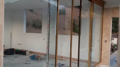 درب اتوماتیک شیشه ای فریم لس سکوریت با شیشه شفاف پولیش شده