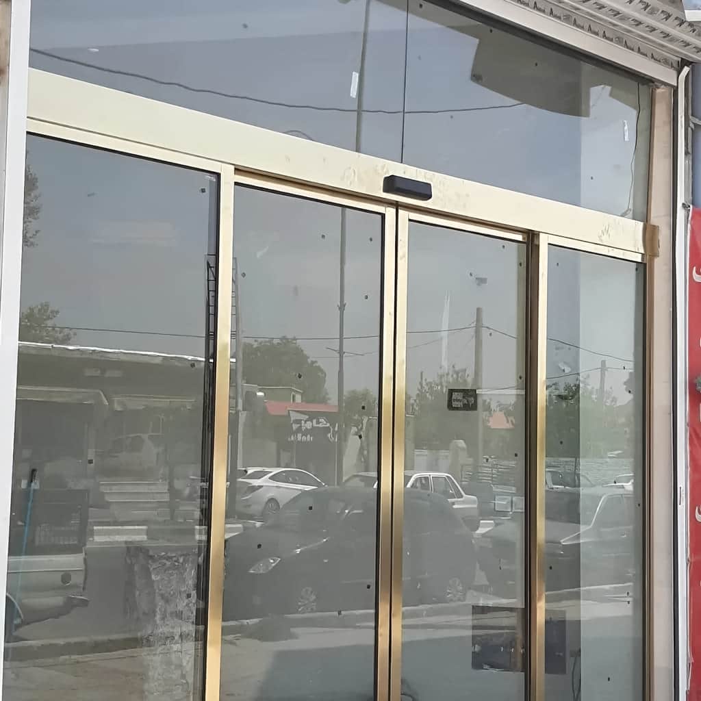 درب اتوماتیک شیشه ای اداری کارتخوان با شیشه سکوریت شفاف