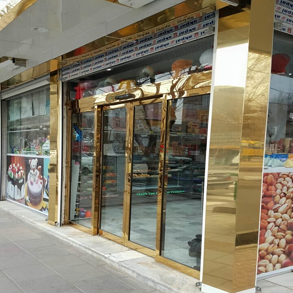 درب شیشه ای اتوماتیک کشویی دو لت با تنظیم سرعت بازشو