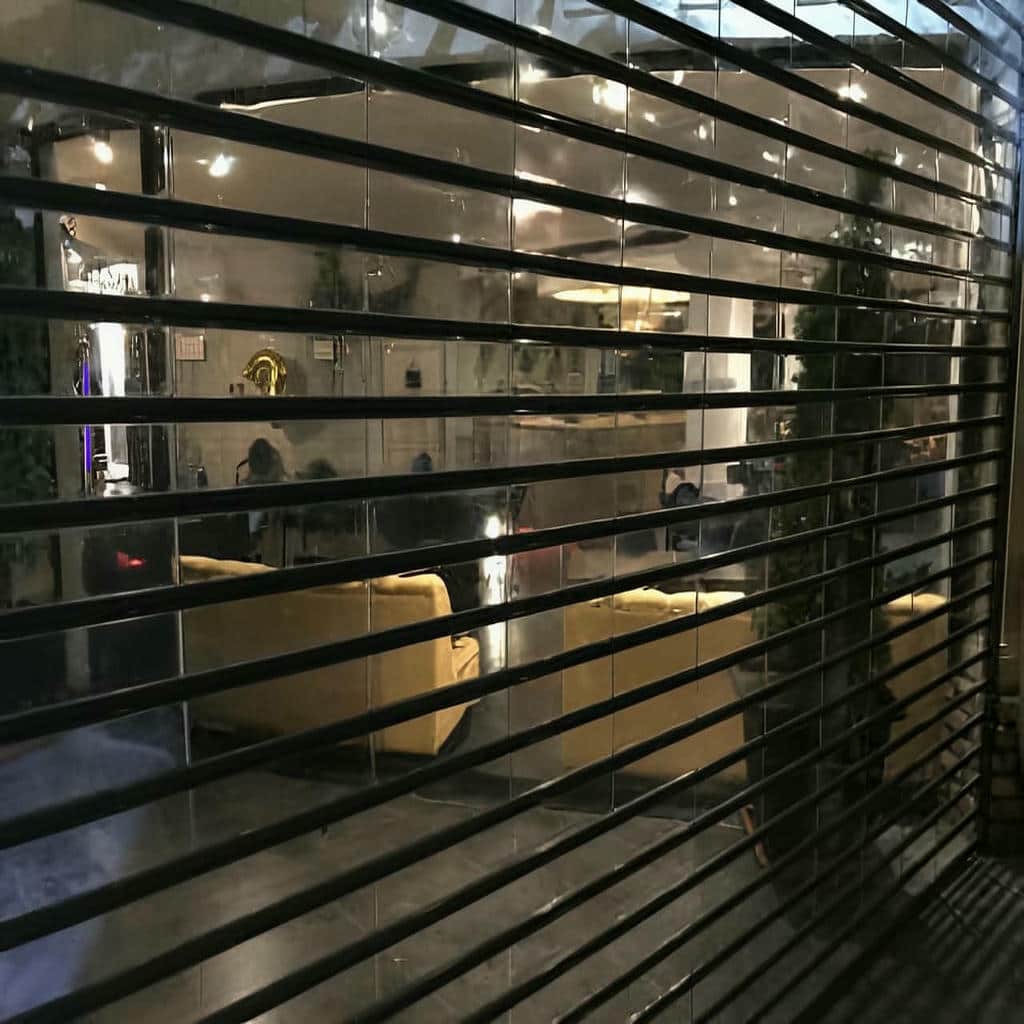 قیمت کرکره برقی رنگی نمای فروشگاه وابسته به رنگ و تجهیزات